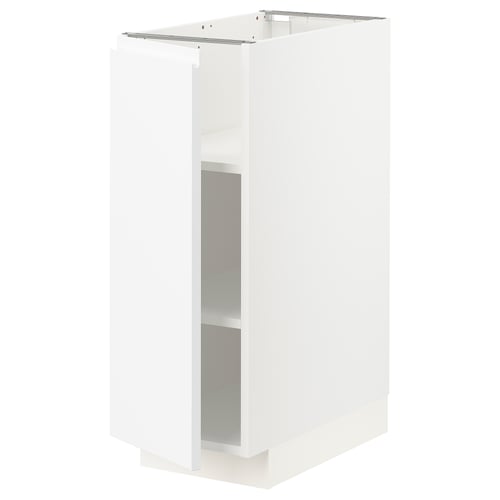 A white METOD kitchen cabinet with a modern, minimalist design. Its rectangular, with a sturdy frame and adjustable shelves.