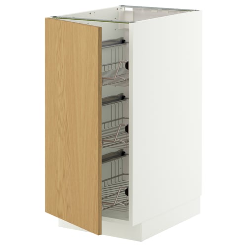 A white METOD kitchen cabinet with a wooden door and wire shelves. The door is open, revealing the interior storage.