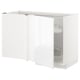 White corner base cabinet with pull-out carousel in modern kitchen.