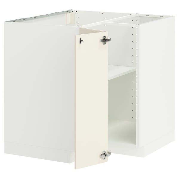 A white METOD kitchen cabinet set with a traditional off-white design, featuring a sturdy frame, adjustable shelves, and reversible doors.