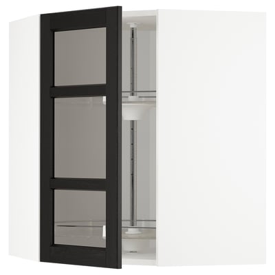 Black kitchen cabinet with frosted glass doors, part of ikeas METOD system. Adjustable shelves, traditional design.