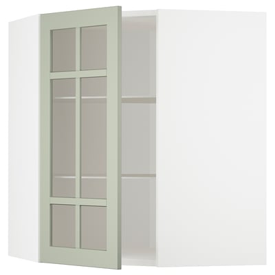 A green ikea METOD kitchen cabinet with adjustable shelves and a glass door in a grid pattern.