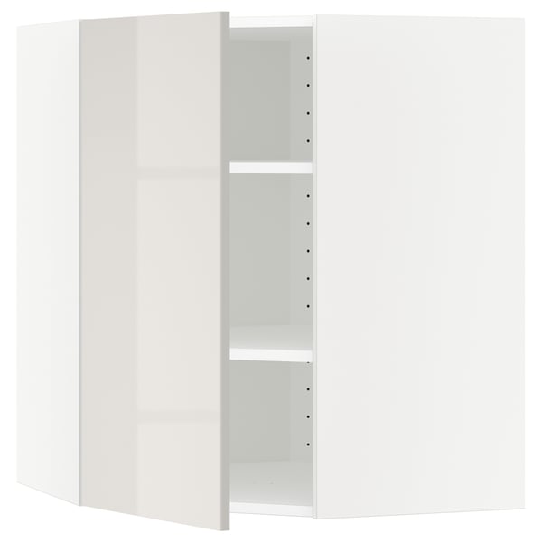 A white METOD kitchen unit with a glossy finish and adjustable shelves.