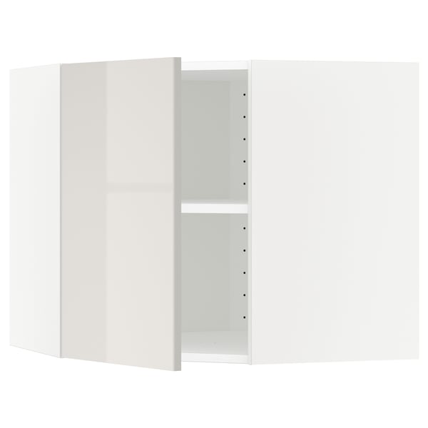 METOD kitchen unit in white with a glossy finish. It a single shelf inside and adjustable door placement.