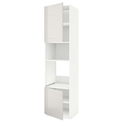 A white METOD kitchen cabinet with adjustable shelves and a modern design.