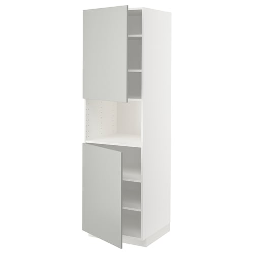 White METOD kitchen cabinet with light grey doors and shelves.