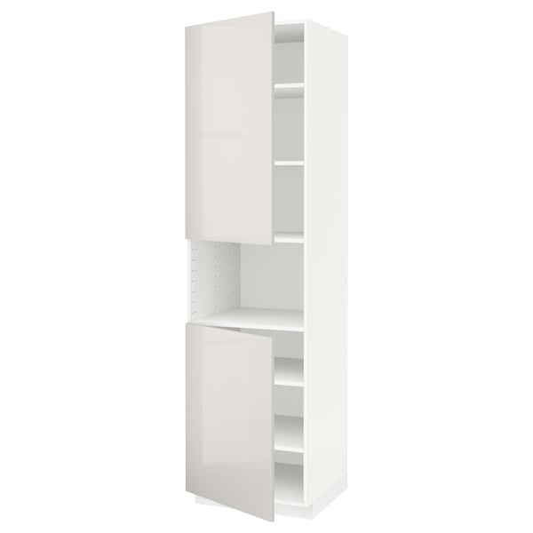 A white METOD kitchen cabinet with two doors. One door has shelves exposed.