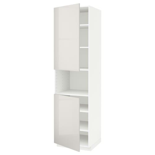A white METOD kitchen cabinet with two doors. One door has shelves exposed.