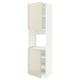 A white and beige METOD kitchen cabinet with adjustable shelves and high gloss doors.