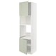 A tall, slim METOD kitchen cabinet in white with green stensund doors, featuring an adjustable shelf and a 25-year guarantee.
