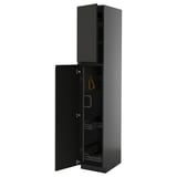 Black kitchen cabinet with open door, glossy finish, rectangular shape, modern design.