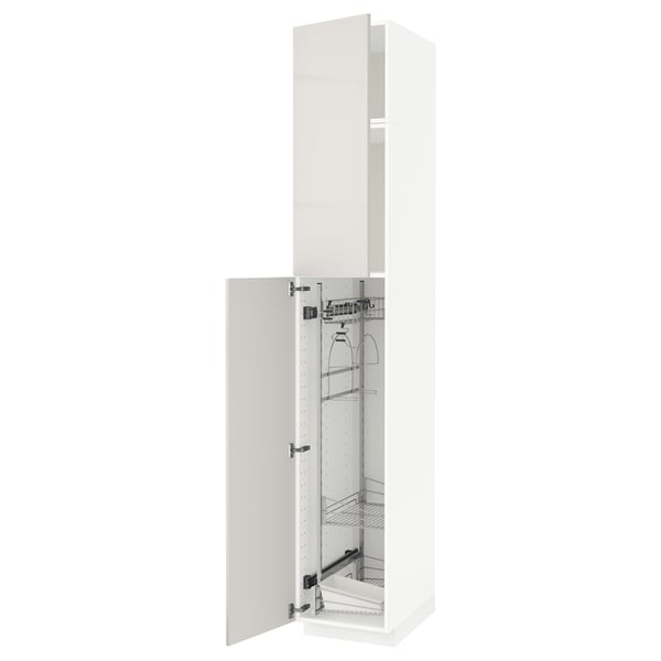 A white METOD kitchen cabinet with sliding door and internal pull-out organizers.