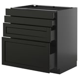 Black kitchen unit with drawers, sleek design.