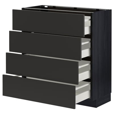 METOD kitchen unit in black with four partially pulled drawers, sleek design.
