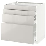 White METOD kitchen unit with multiple drawers.