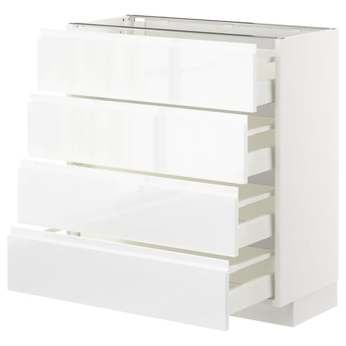 White high gloss kitchen cabinet with pull-out drawers.