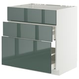 A modern kitchen cabinet from the METOD system with three high-gloss grey-green drawer fronts.