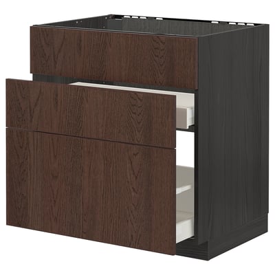 Dark wood-colored METOD kitchen cabinet with oak veneer and pull-out drawers.