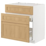 METOD kitchen unit with oak veneer drawers and white base, designed for built-in oven/sink.