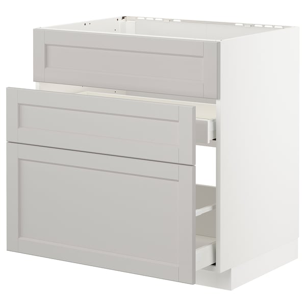 Light grey METOD kitchen cabinet with smooth drawers and bevelled edges.