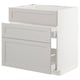 Light grey METOD kitchen cabinet with smooth drawers and bevelled edges.