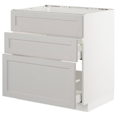 White, modern, multi-drawer cabinet with sleek design and beveled edges.