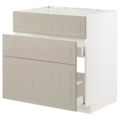 Light beige METOD kitchen cabinet set, featuring drawer and door designs, with a sleek, modern aesthetic.