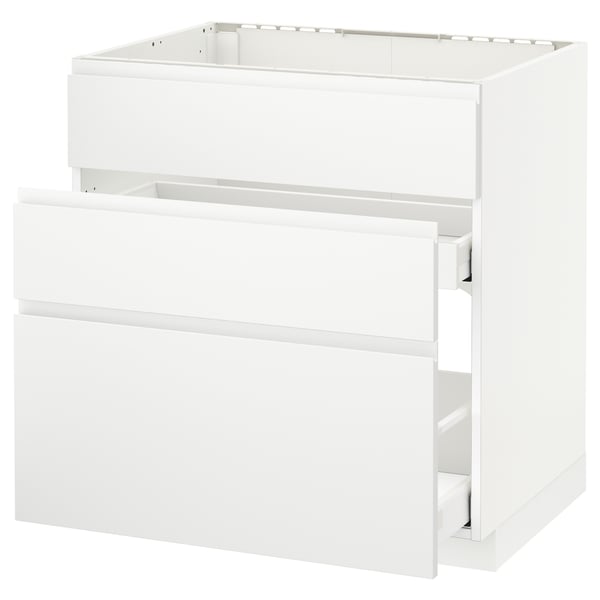 A white METOD kitchen unit with drawers and a cabinet, featuring a sleek, modern design.