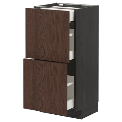 Dark wood METOD kitchen unit with two cabinet doors and three drawers.