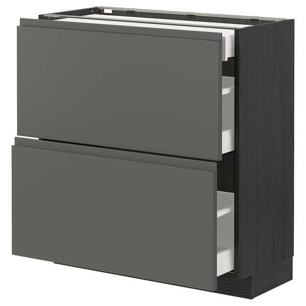 Modern dark grey METOD kitchen cabinet with sleek, handle-less design and multiple drawers.