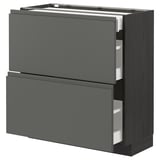 Modern dark grey METOD kitchen cabinet with sleek, handle-less design and multiple drawers.