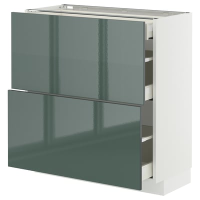 Modern kitchen unit: METOD cabinet with kallarp high-gloss grey-green fronts, sleek design, white frame, four drawers.