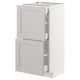 Ikea METOD kitchen unit in light gray with beveled edges, featuring two drawers and a cabinet. .