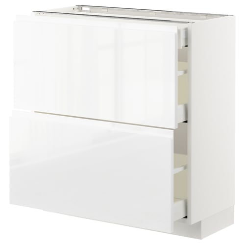 White METOD kitchen unit with high-gloss finish and sleek, handleless drawers.
