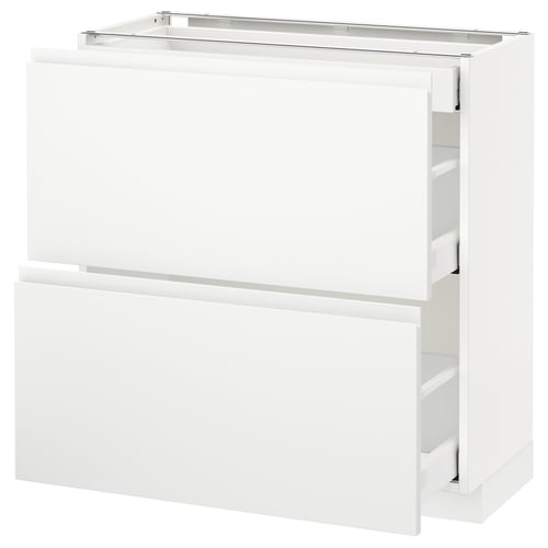 White modern kitchen drawer unit. High gloss finish. Two open drawers reveal smooth runners.