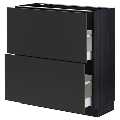 Black METOD kitchen cabinet with two open drawers.