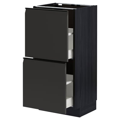 Modern kitchen unit, METOD, in matte black with sleek, handleless fronts and smooth drawers.