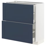 This image shows a white METOD kitchen cabinet with two blue drawers and a door. The design is modern and sleek.