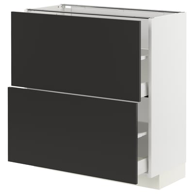 Modern kitchen cabinet in white with black drawers, rectangular, sleek design.