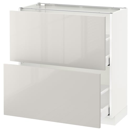 METOD high gloss white kitchen cabinet set with drawers and shelves.