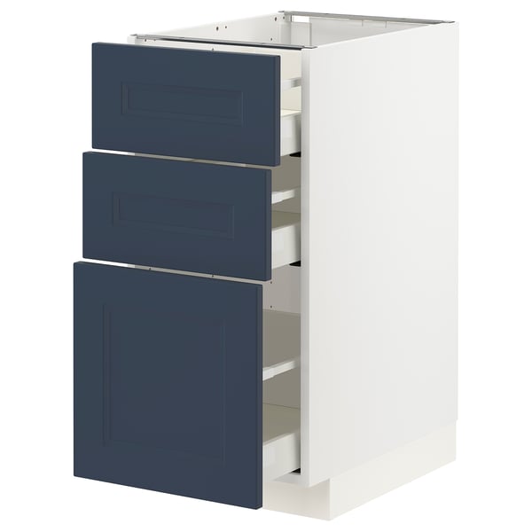 Blue METOD kitchen drawers, modern minimalist design in white cabinet.