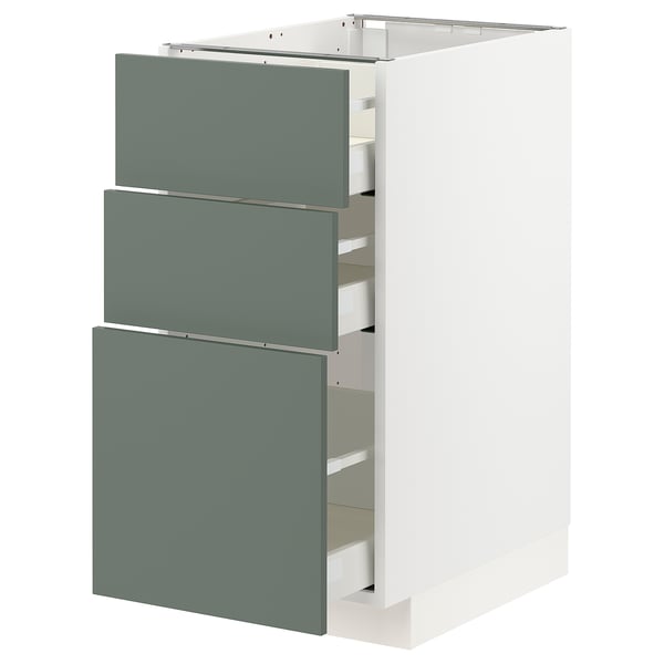 Modern IKEA METOD kitchen cabinet with 3 drawers, sleek, self-closing.