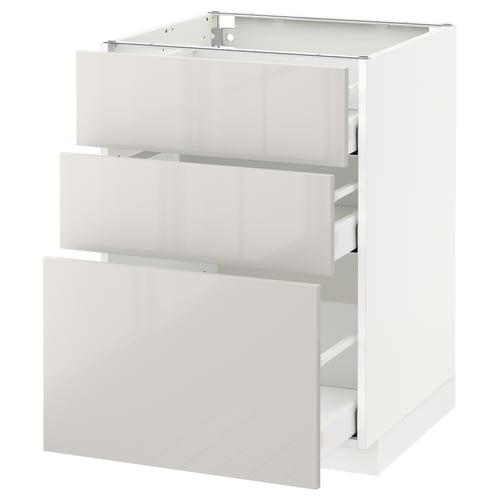 White ikea METOD kitchen cabinet with glossy drawers.