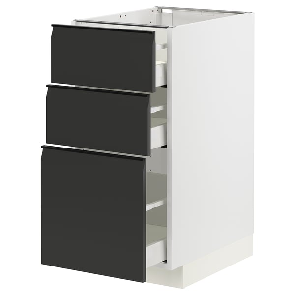 METOD kitchen unit, black drawers, white base, sleek modern design.
