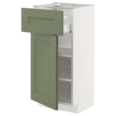 Green-white METOD kitchen cabinet with drawer and shelves, modern design.