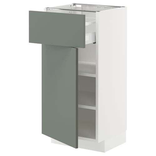 Modern kitchen cabinet with grey-green door, white body, and adjustable shelf.