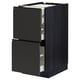Black kitchen cabinet with two large drawers and integrated handles.