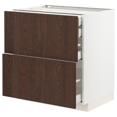 METOD kitchen cabinet with dark brown wood & white base, three drawers open, sleek modern design.