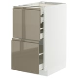 Modern kitchen cabinet with sleek, dark grey-brown high-gloss drawers and integrated handles on a white base. Multiple drawers with smooth sliding.