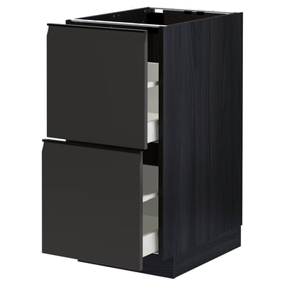 Modern black kitchen cabinet, ikea METOD, with two open drawers, sleek handles, and dark wood grain texture, stylish and functional.